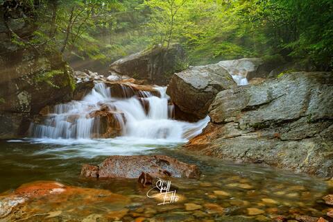 A waterfall on the Pemigewasset River at the The Basin in Fraconia Notch State Park