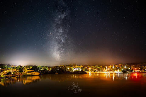 Milky Way rising above Meredith Mills and Meredith Bay on Lake Winnipesaukee in Meredith NH.