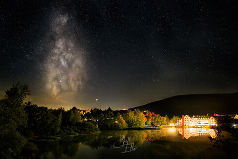 Milky Way and Town Square Village on Corcoran Pond in Waterville Valley, NH.