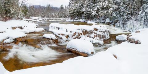 The Swift River flows down the Rocky Gorge in winter.
