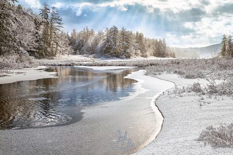 spring snow sunrays pemigewasset lake