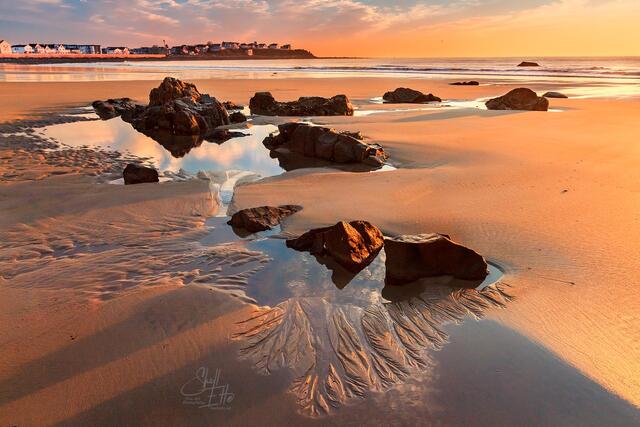 Rock pools and sand sketches at low tide on Hampton Beach in NH
