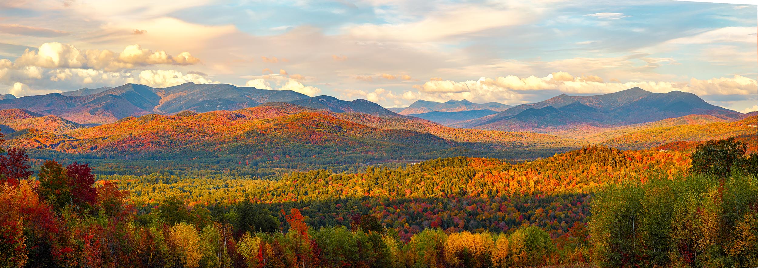 Autumn Evening in the White Mountains, Ellsworth An autumn view of Welch -Dickey, Tecumseh White Mountains and Sandwich Mtn Range from Ellsworth Hill, NH.