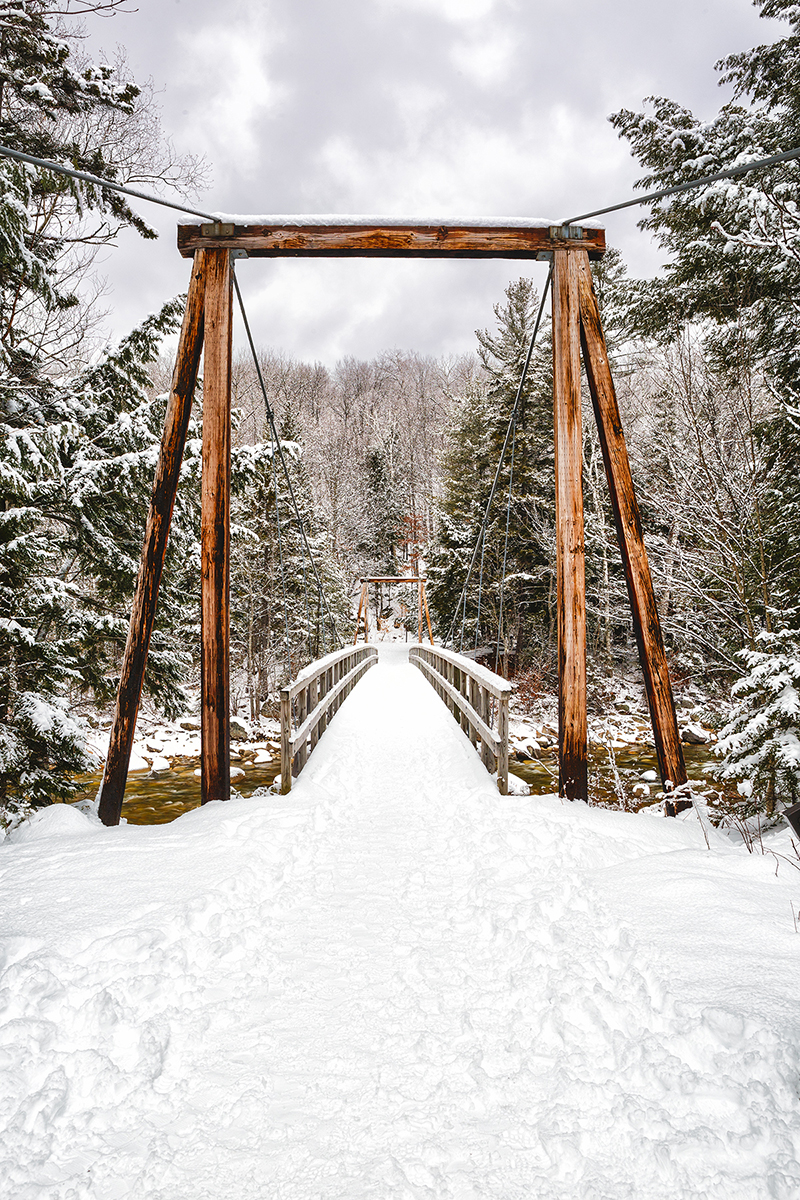 Lincoln Woods Bridge Winter The Lincoln Woods suspension bridge covered in snow in Lincoln, NH