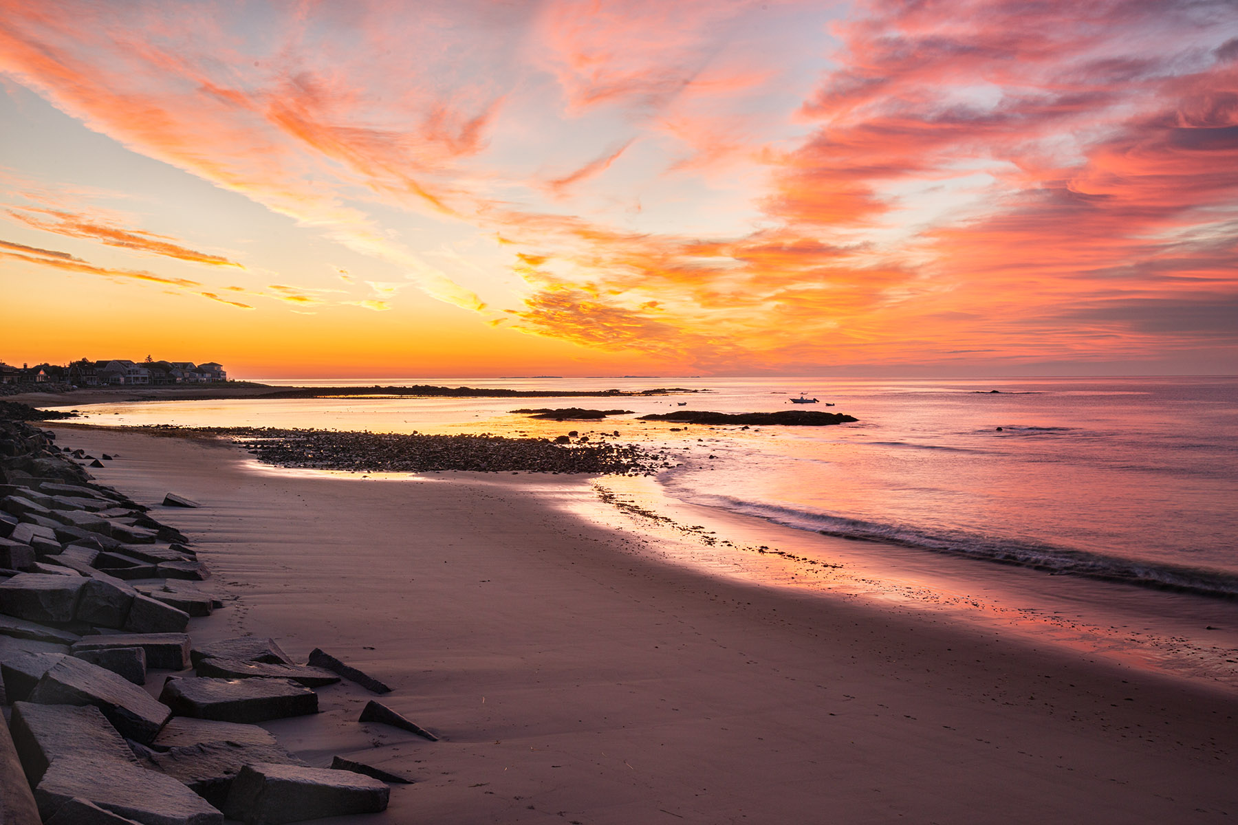 North Beach Sunrise, Hampton A sunrise at the break wall on North Beach in Hampton.